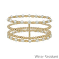 Water Resistant Set of 4 Gold and Pearl Beaded with Thin Cross Stretch Bracelets